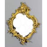 A 19th Century French gilt brass wall mirror by Gustave Vincent, Rcmans (?) (Drome), the whole of