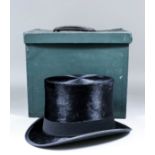 A Dunn & Co black brushed silk top hat with original box