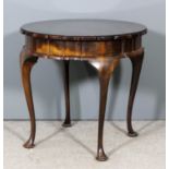 A 20th Century South African stinkwood circular occasional table of shaped outline, on four cabriole