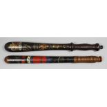A Victorian turned wood truncheon painted with a crown over the royal cipher above the arms and