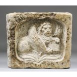 An antique Italian marble plaque carved with the winged lion of St. Mark The Evangelist with the