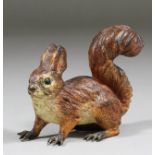 A good cold painted bronze figure of a red squirrel, 3.125ins high