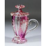 A 19th Century Continental pink flashed glass hexagonal cup and cover, three panels engraved with