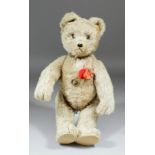 A 1950s Schuco "Tricky" fawn mohair plush "Yes/No" musical teddy bear, 16.75ins high, with moving