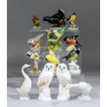 A collection of English and Continental ceramic bird models, including - Crown Staffordshire "