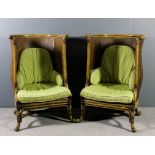 A pair of modern simulated bamboo framed high back tub shaped easy chairs with double cane backs,