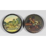 A 19th Century papier-mache circular snuff box and cover, the cover painted with two figures