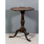 A mahogany circular tray top tripod occasional table on heavy turned central column and cabriole