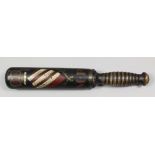 A short Victorian turned wood truncheon painted with a crown and "VR" over the Manchester coat of