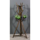 A late Victorian bamboo jardiniere stand with central support and three splayed supports, 6ins