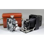 A Paillard Bolex cine camera and lenses for same, and brown leather case for same, and a Cameo plate
