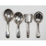 Three George IV silver caddy spoons - with oval bowl with wrigglework in the form of flowers and