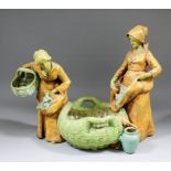 A late 19th/early 20th Century Austrian Amphora  pottery figural group of two gleaners standing