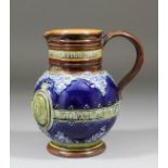 A late 19th Century Doulton stoneware jug commemorating Queen Victoria's Diamond Jubilee of 1897,