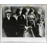 Black and white photograph - "The Rolling Stones", 8ins x 10.25ins, signed in biro by five members