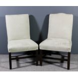 A pair of mahogany framed high back occasional chairs upholstered in cream cloth, on square