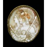 A mid Victorian gold coloured metal mounted shell cameo, the oval face carved with a figure of a
