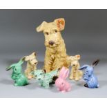 A collection of Sylvac pott animals, comprising - four dogs, 3.75ins high to 11.5ins high, and three