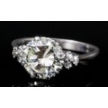 A modern 18ct white gold mounted solitaire diamond ring, the brilliant cut stone approximately 2.4ct