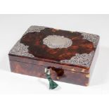 A late Victorian tortoise-shell and silver mounted rectangular box, the cover applied with central