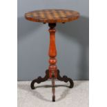 A Victorian rosewood burrwood and mahogany circular tripod games table, the top inlaid with chess