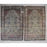 Two Tabriz rugs woven in colours with mihrab filled with numerous floral motifs on a dark blue field