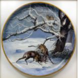 A late 19th Century English pottery circular charger painted by Gustav Leonce with a winter scene