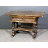 A 17th/ 18th Century South German oak and pine "Money Changers" rectangular table with lifting top