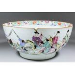 A large 18th Century Chinese porcelain punch bowl, the exterior painted in the "Famille Rose"