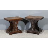 Two oak rectangular low occasional tables with moulded edge to top, the shaped supports carved