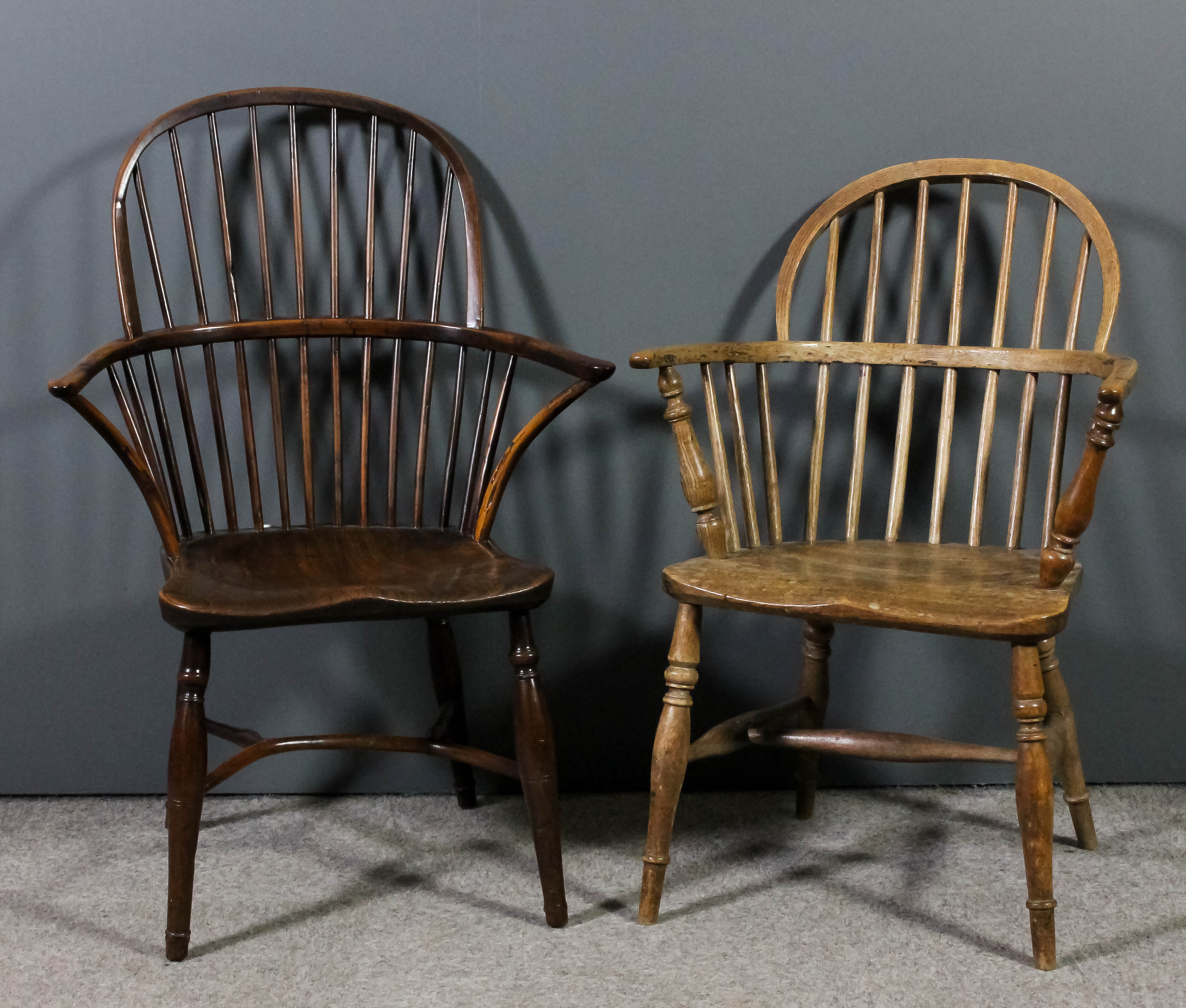 A 19th Century yewwood and elm seated stick back Windsor armchair with two tier back, on turned