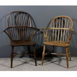 A 19th Century yewwood and elm seated stick back Windsor armchair with two tier back, on turned