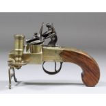 An early 19th Century brass, steel and walnut stock flintlock tinder pistol with candle sconce and