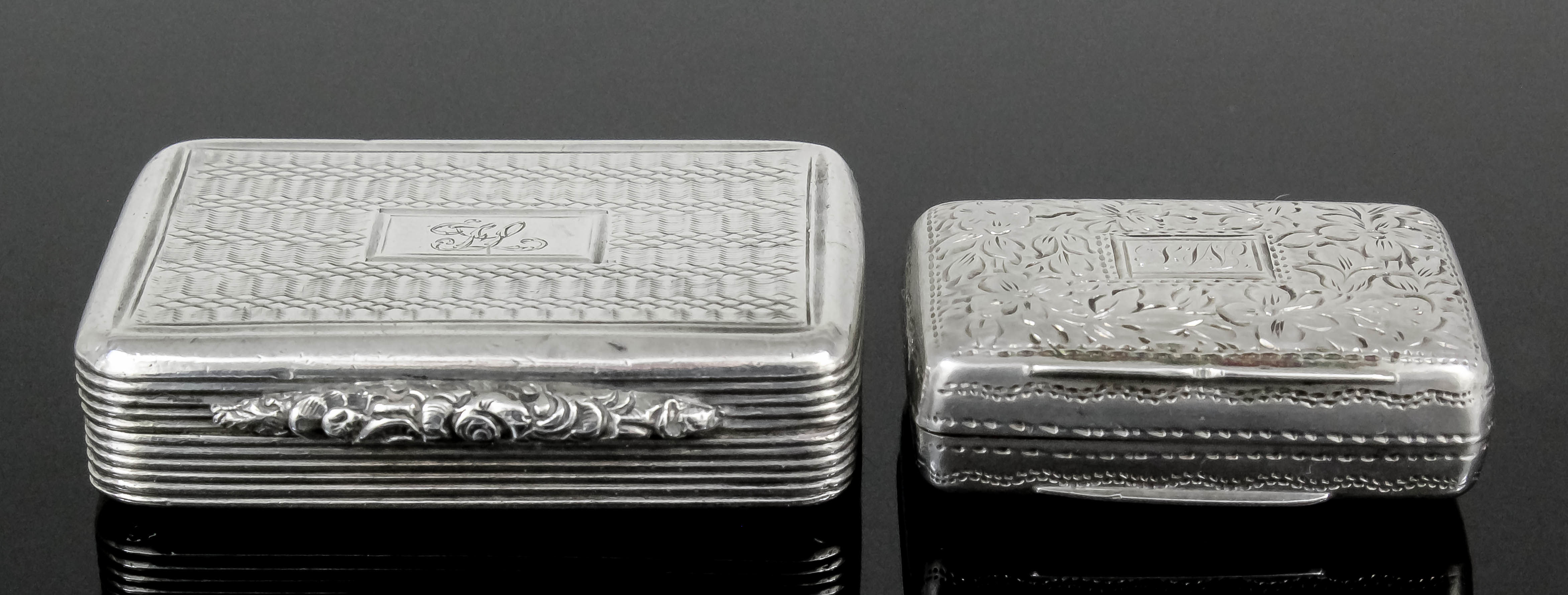 A George IV silver rectangular vinaigrette with cast leaf scroll pattern thumbpiece and engine