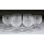 A set of six 19th Century glass rummers with diamond and slice cut-glass bodies, knops to stems,