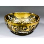 A Japanese "Satsuma" pottery bowl with indented rim, enamelled and gilded with Sages and Geishas,