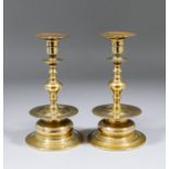 A pair of late 19th Century Swedish brass candlesticks of 16th Century design by Gusums Bruk, 8ins