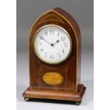 An Edwardian mahogany cased mantel timepiece, the 3.25ins diameter white enamel dial with Arabic