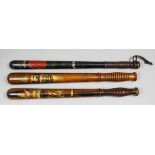 A Victorian turned wood truncheon painted with "V.R." over an oval cartouche worded "G.S.C." over