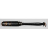 A mid Victorian turned wood truncheon painted with a crown over the "VR" cipher on a black ground (