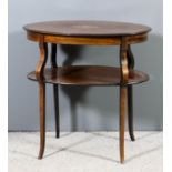 A late Victorian rosewood oval two tier etagere inlaid with stringings, the top inlaid with