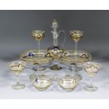A suite of French cut, gilt and blue enamelled glass tableware (approximately 80 pieces - some
