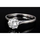 An 18ct gold white gold mounted solitaire diamond ring, the brilliant cut stone approximately 0.