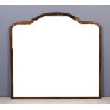 A 20th Century South African stinkwood framed rectangular wall mirror with arched top by Reid's of