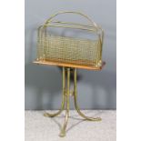 A late Victorian oak and brass two division newspaper rack, 29ins high x 16.5ins wide