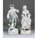 A pair of late 19th/early 20th Century Continental porcelain figures of a gallant and his female