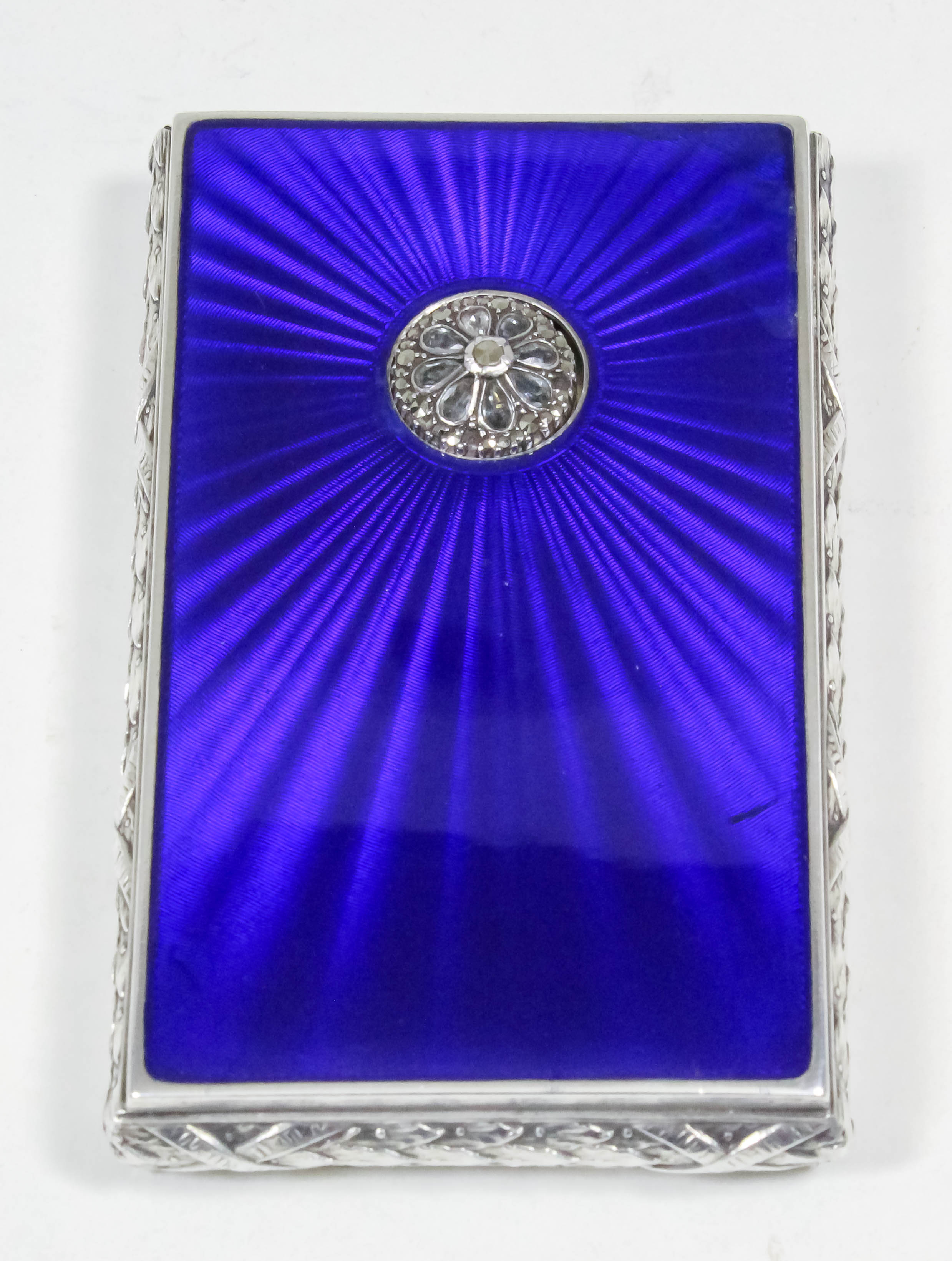 A Continental silvery metal and royal blue guilloche enamel rectangular card/cigarette case with