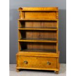 An early Victorian birdseye maple open front "Waterfall" bookcase, the tray top on slender turned