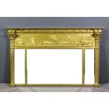 A 19th Century gilt overmantel mirror, the moulded cornice with ball ornament above frieze moulded