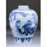 A late 17th Century Delft blue and white baluster shaped vase decorated in the Chinese